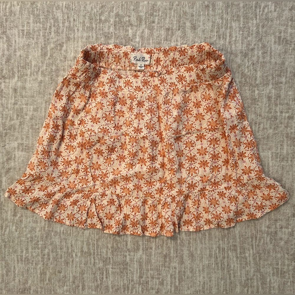 Pink Rose peach colored + patterned mini skirt size M